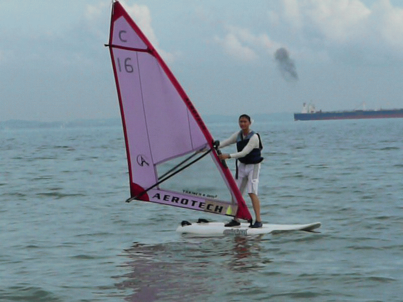 Winston W. L. Ho windsurfing.